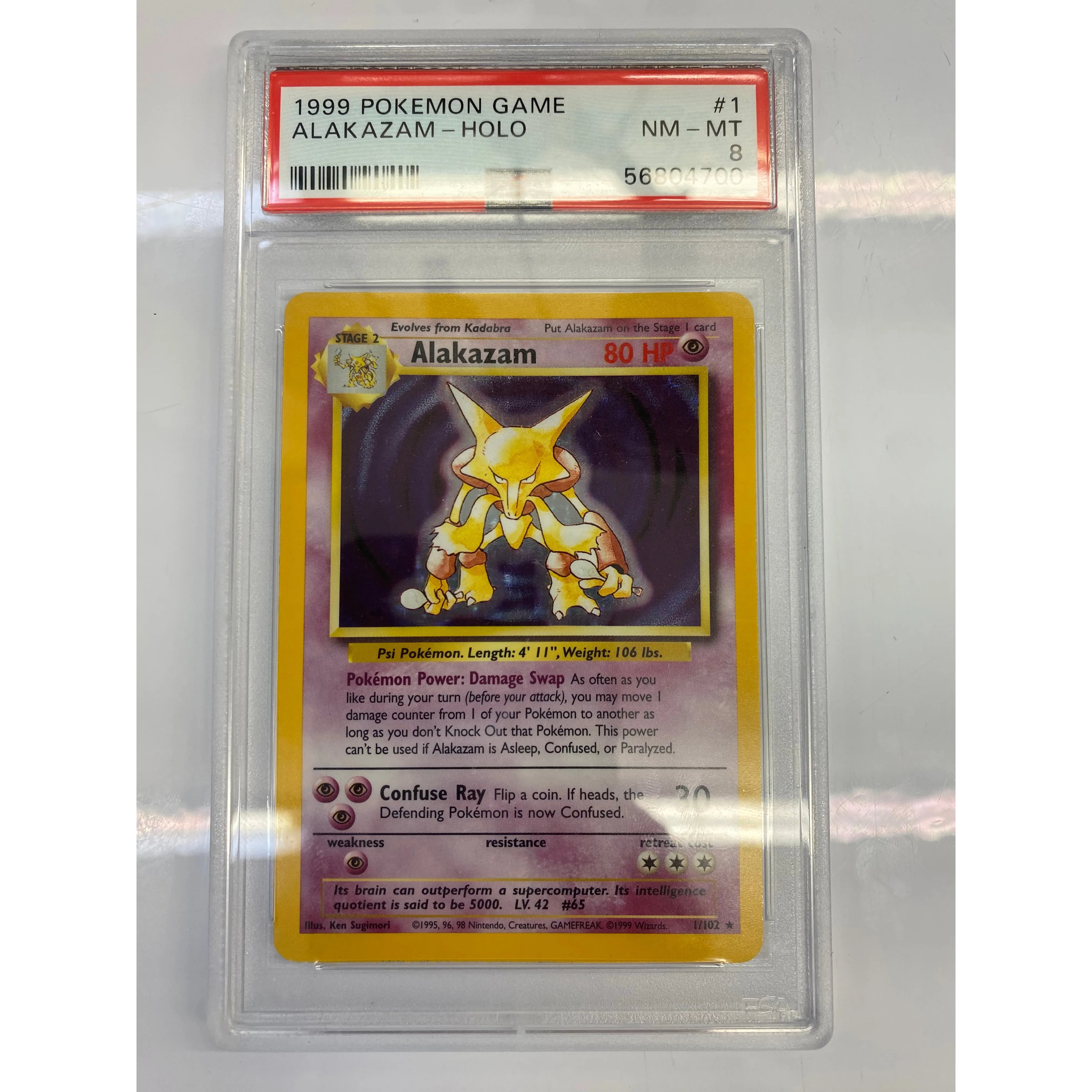 PSA 8 - 1999 Alakazam Holo